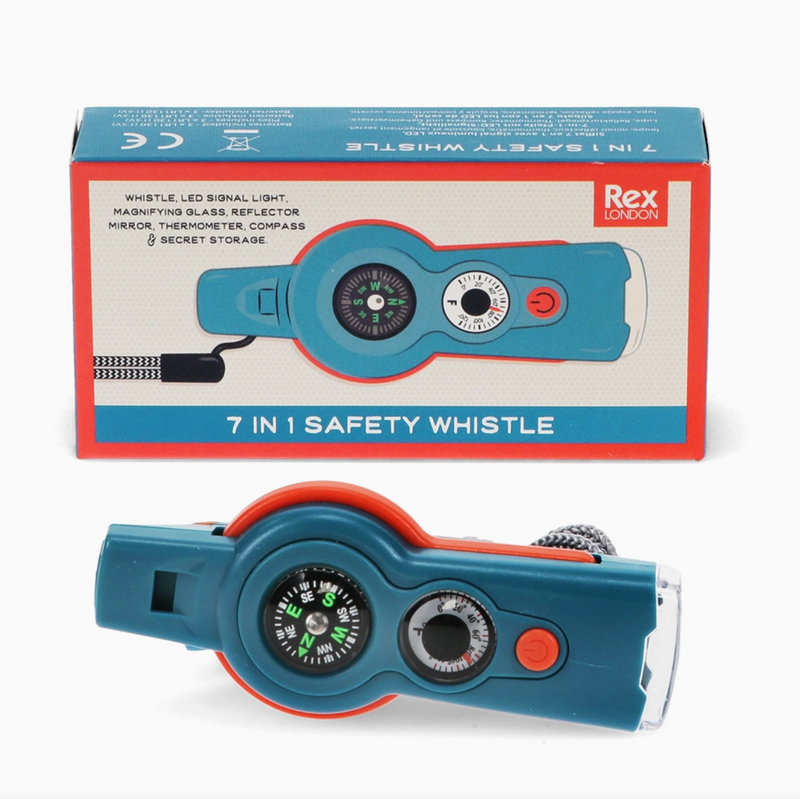 whistle with compass on white background and box behind
