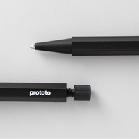 Black pen with 'prototo' branding on a light gray background