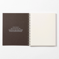 Open notebook with text on a white background