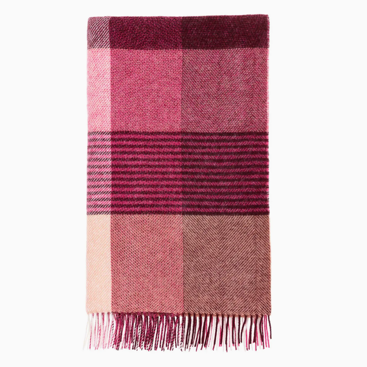 A folded plaid scarf in shades of dusty pink, burgundy, and beige, featuring fringed edges, shown against a plain white background.