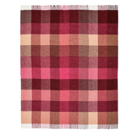 A rectangular woven throw blanket with a plaid pattern in shades of pink, burgundy, beige, and brown, featuring white fringe on the top and bottom edges, shown against a plain white background.