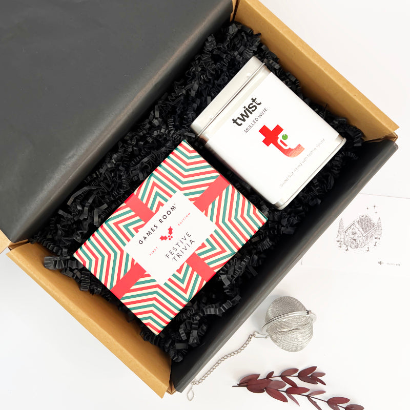 Gift set with 'twist' product and festive trivia book in a box