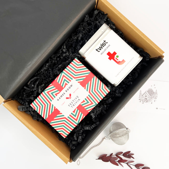Gift set with 'twist' product and festive trivia book in a box