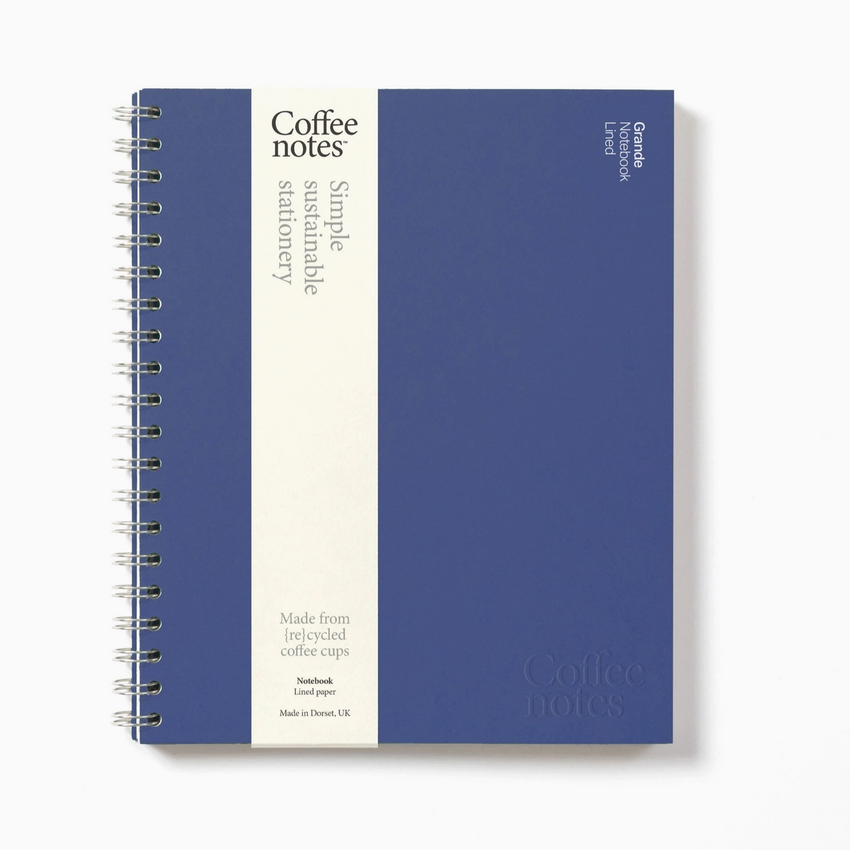 Blue notebook with white text on a white background