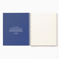 Spiral-bound notebook with blue cover and white pages on a white background