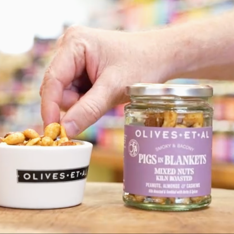Image of bowl with nuts and jar with mixed nuts in