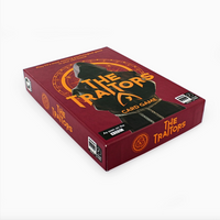 The Traitors card game box in dark red packaging with gold and black graphics, shown at an angle on a light gray background.