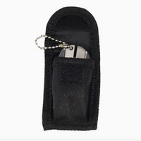 A black nylon sheath containing a folding knife with a silver metal ball chain keyring, shown against a plain white background.