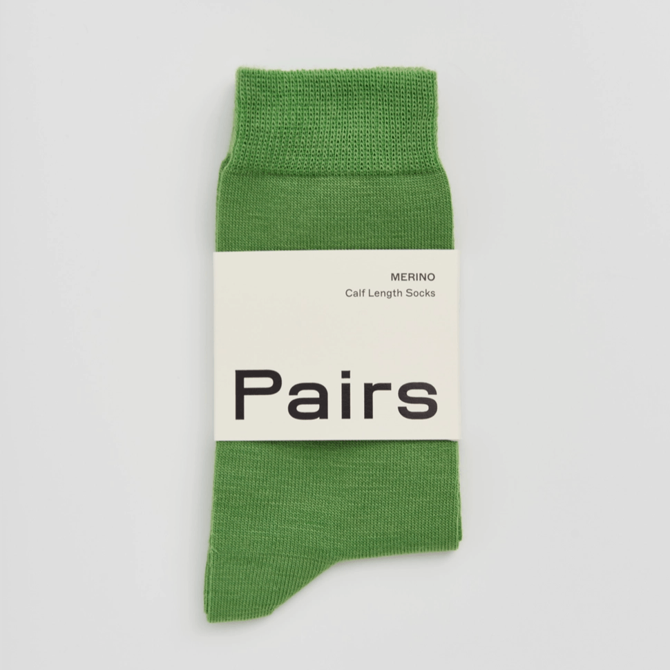 Green Socks with Pairs label on light background