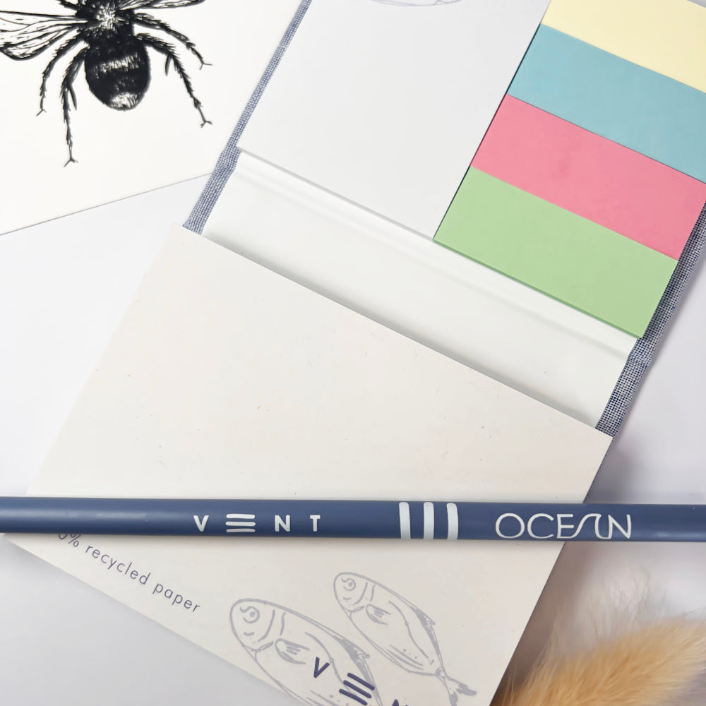 Up close vent for change sticky notes and ocean pencil