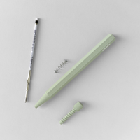 Sage Prototo pen taken apart on a light grey background
