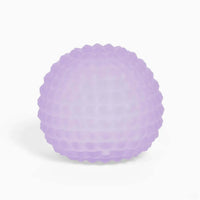 Purple textured ball on a white background