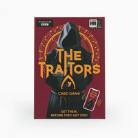 The Traitors card game box featuring a dark hooded figure with the title in large gold letters on a burgundy background, with a small BBC logo and age rating shown on the packaging.