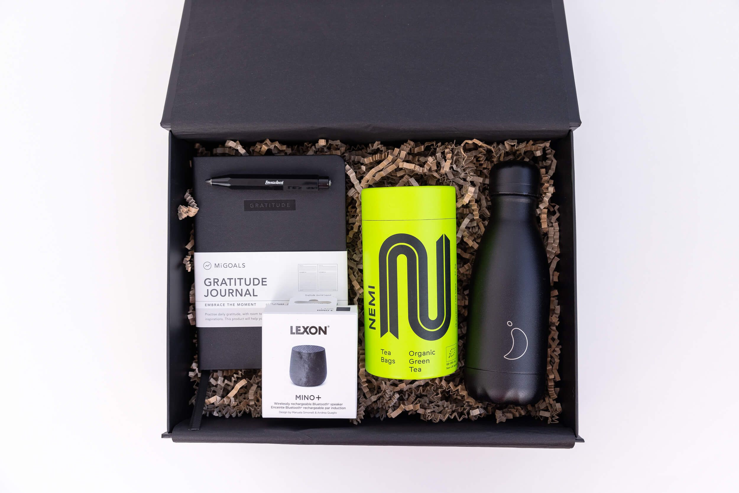 New year corporate gifts including Gratitude journal, Lemon mini speaker, Nemi tea and a Chilly's water bottle