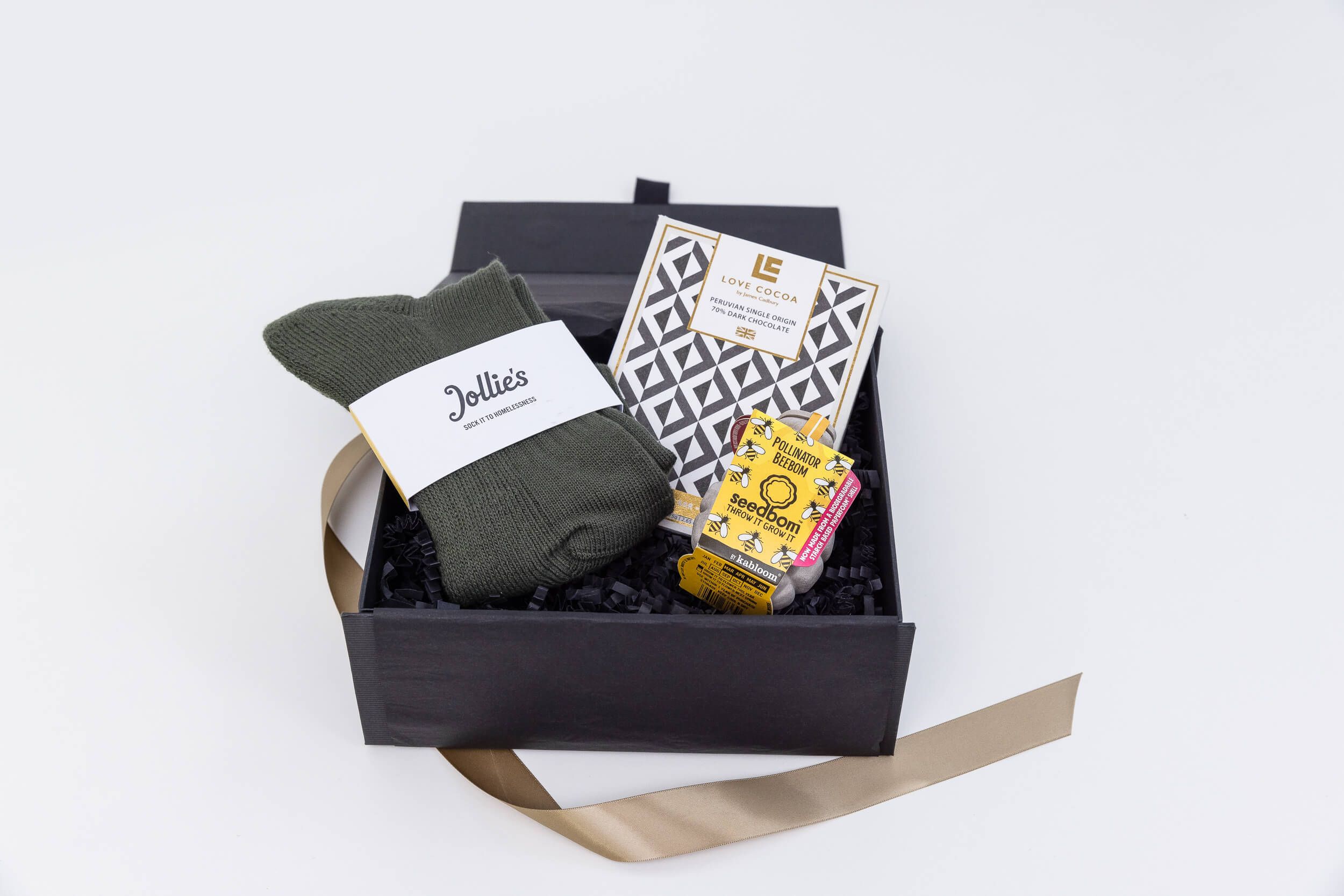 Christmas Employee Gifts with a pollinator beebom, Jollie's socks and Love Cocoa chocolate