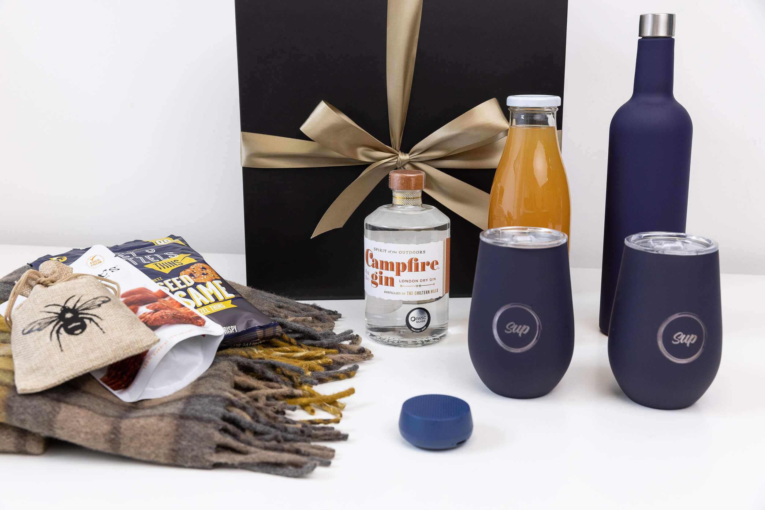 Christmas Employee Gifts with Sup drinkware, tartan wool blanket and Campfire gin