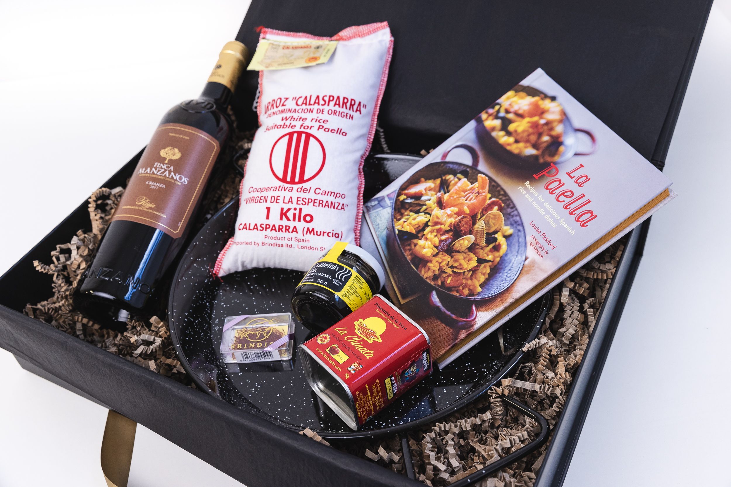 Spanish Feast Christmas Employee Gifts with La Paella cook book, a Paella pan and ingredients
